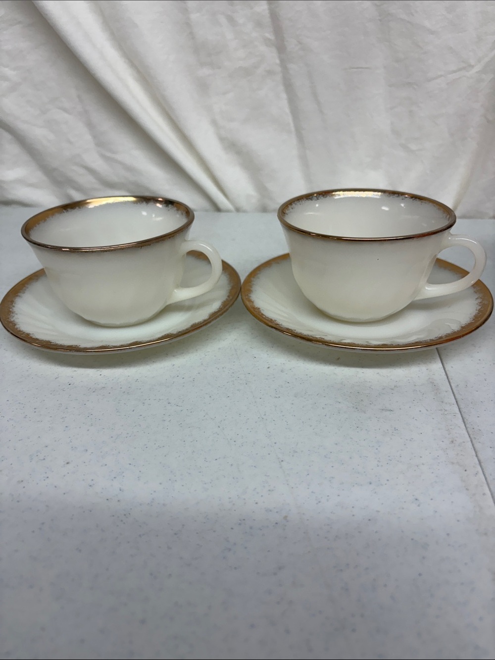 Elegant White Teacup and Saucer Set with Gold Trim - fire king  (bundle )